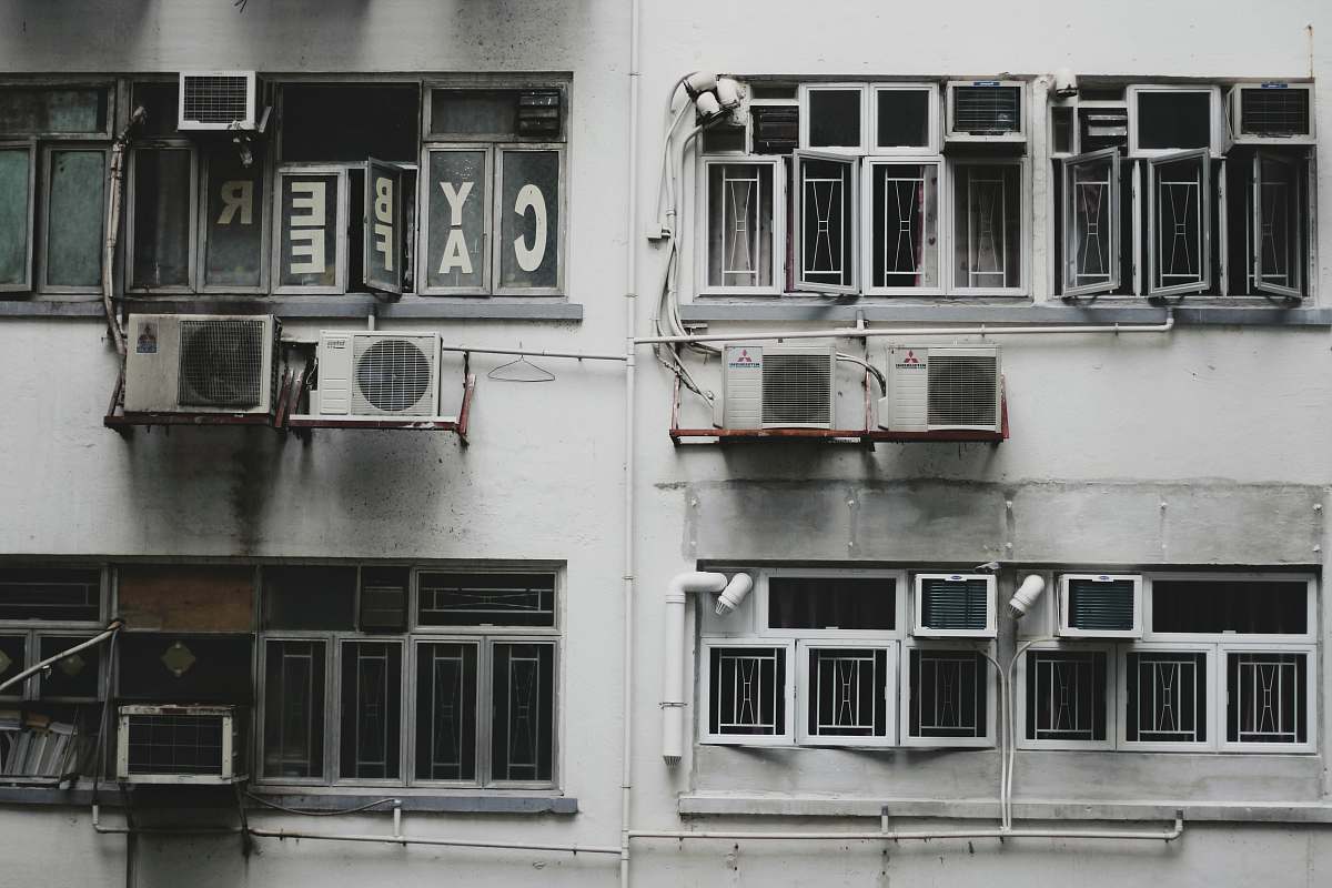 hong kong white window-type air conditioner on wall balcony